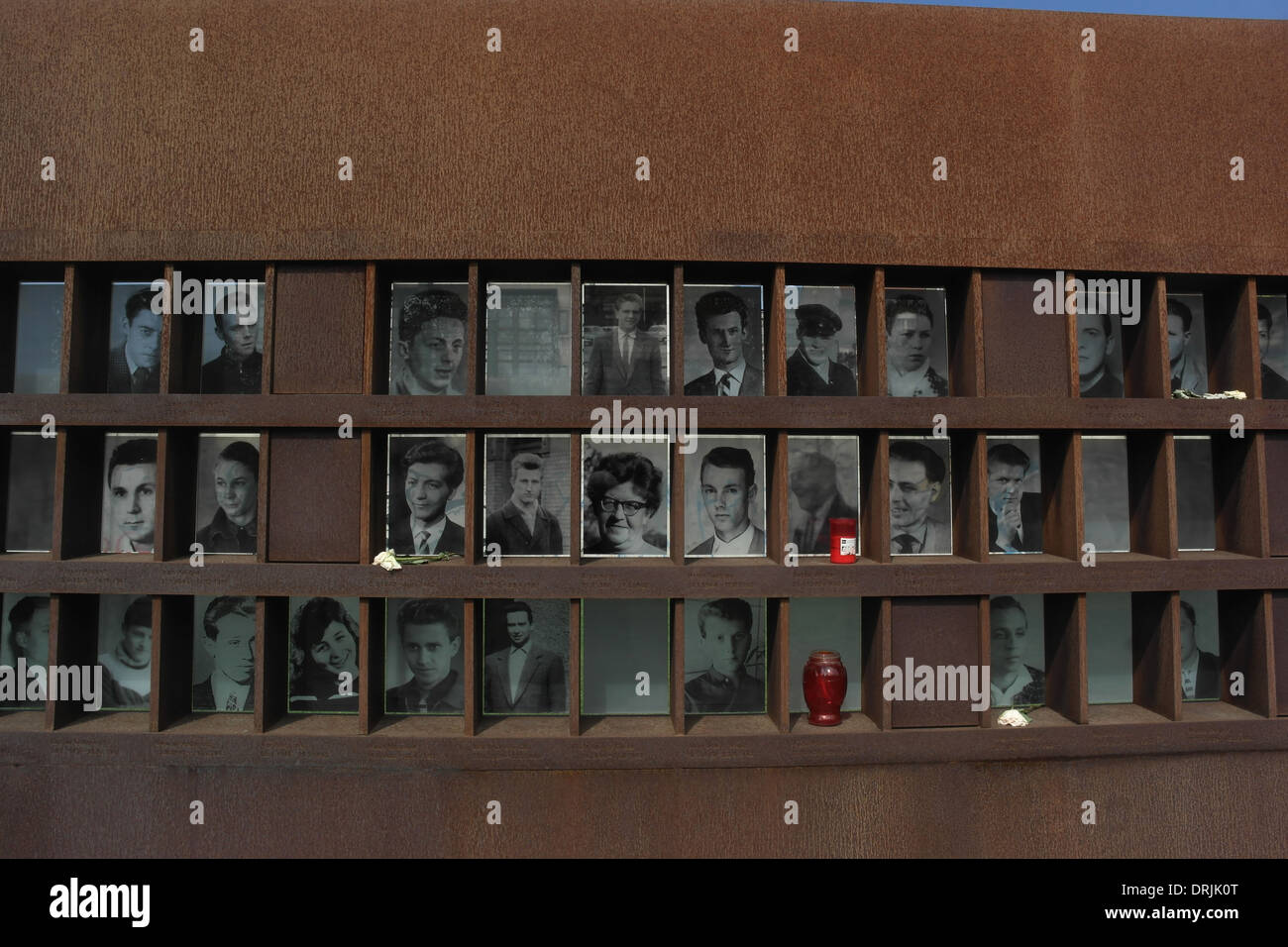 Sunny view three rows monochrome photographs 34 Berlin Wall victims