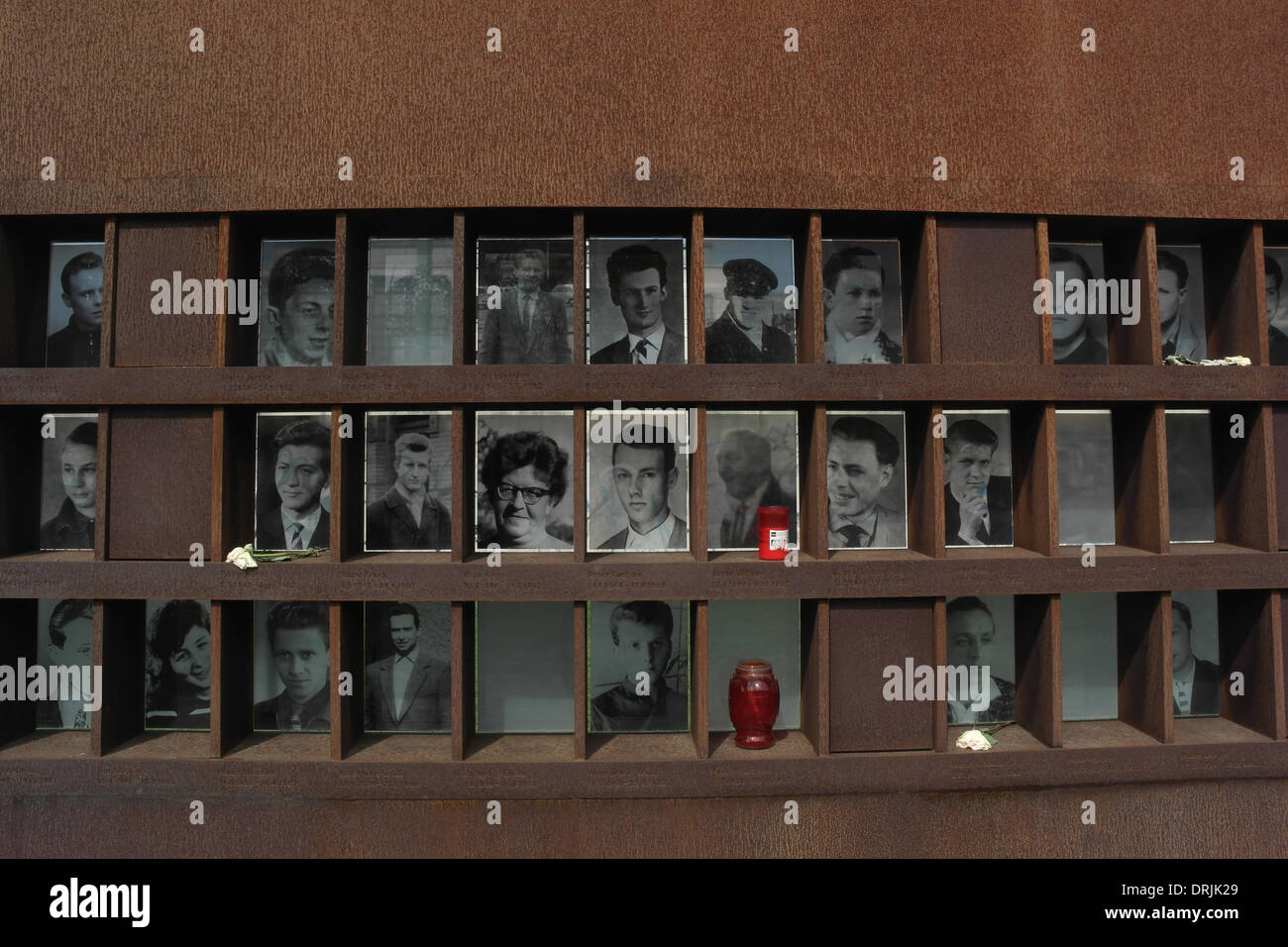 Sunny view three rows monochrome photographs 29 Berlin Wall victims