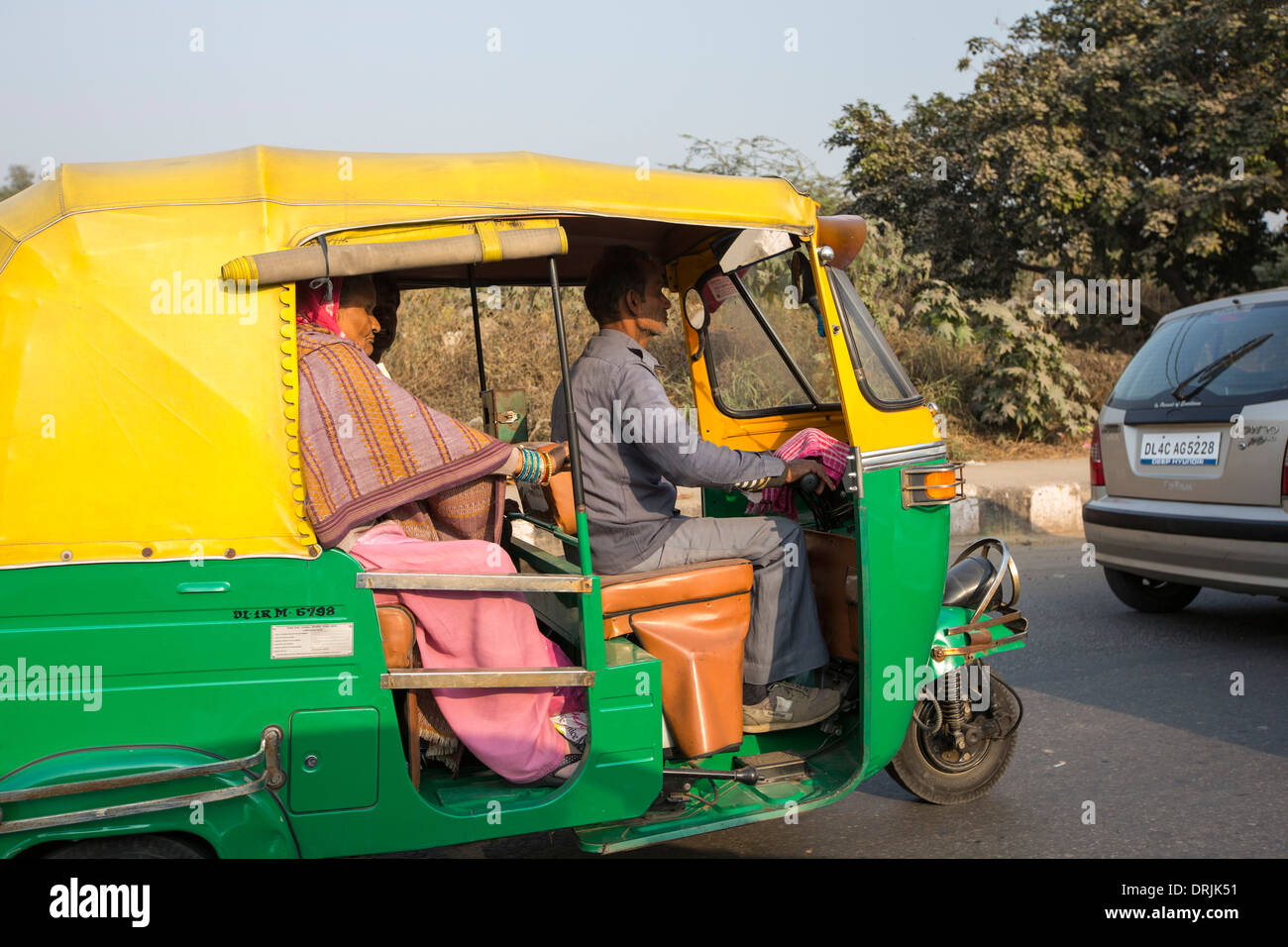 A tuctuc in Delhi, India, fuelled by compressed natural gas (CNG), all of Delhi's tuctucs are powered by CNG, significantly helping Delhi's air quality problems. Stock Photo