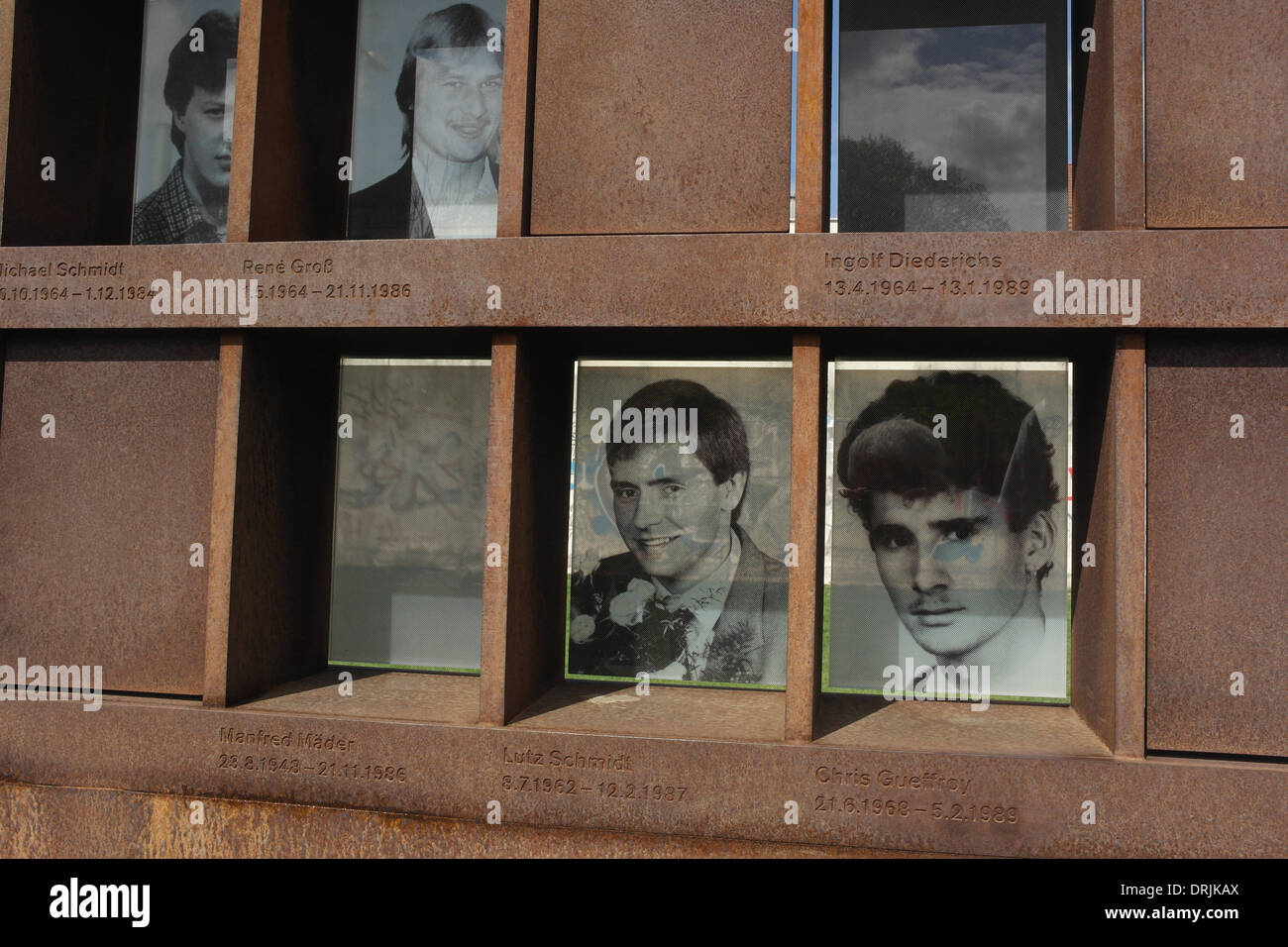 Sunny view two rows monochrome photographs 6 Berlin Wall victims