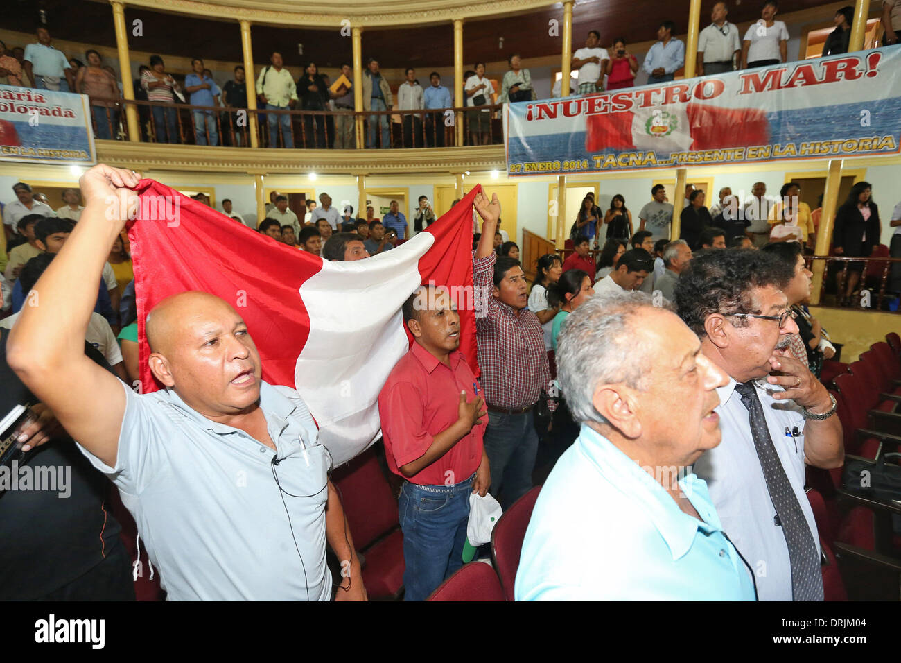 Tacna, Peru. 27th Jan, 2014. Residents celebrate after the decision of the International Court of Justice (ICJ) about the maritime dispute with Chile in the Municipal Theater of Tacna, Peru, on Jan. 27, 2014. Credit:  Oscar Farje/ANDINA/Xinhua/Alamy Live News Stock Photo