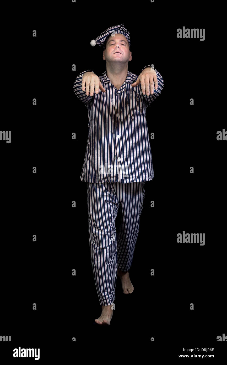 sleeping man walks in pajamas Stock Photo - Alamy