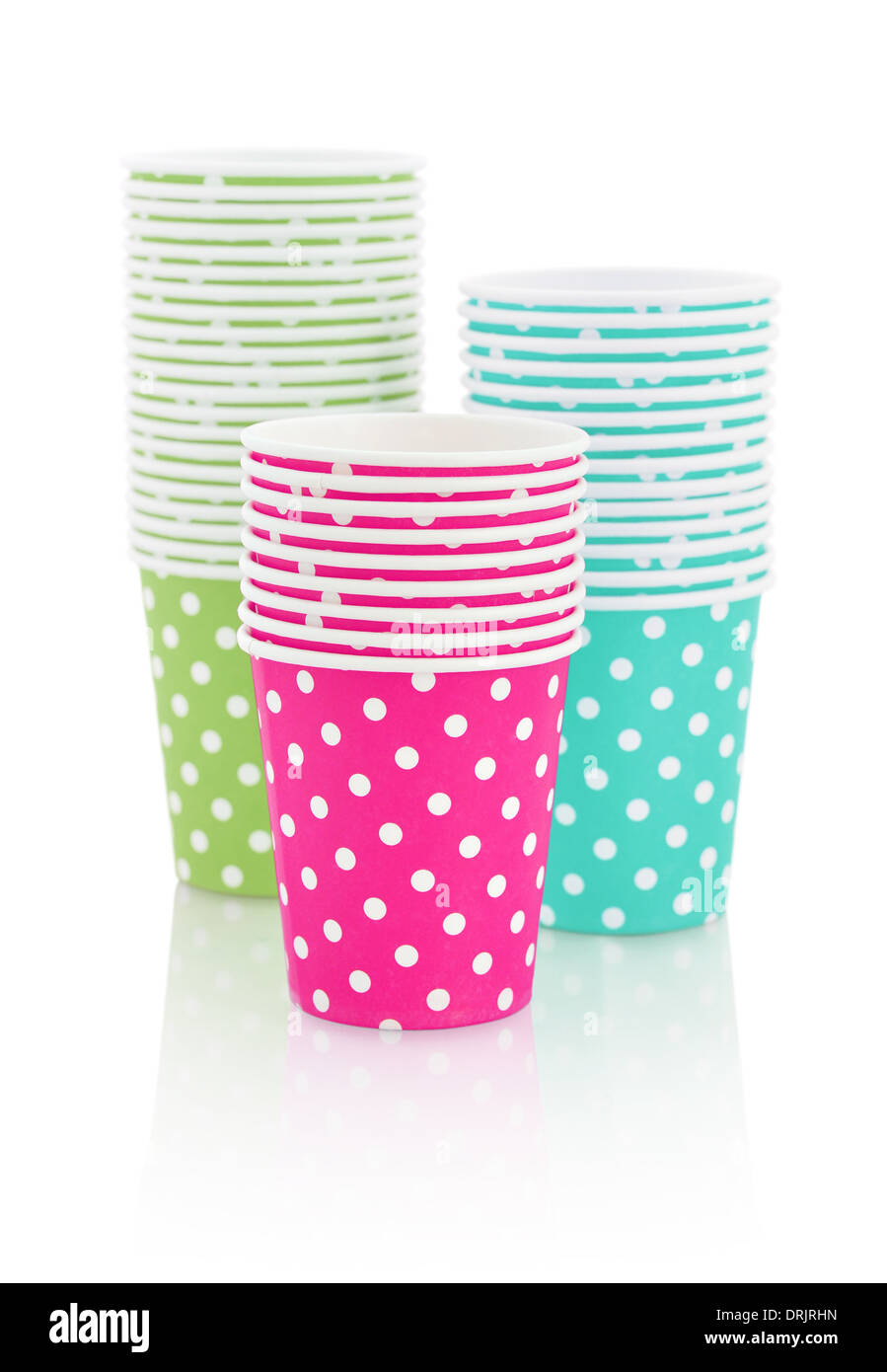 Colorful polka dot paper cups isolated on white. Stock Photo