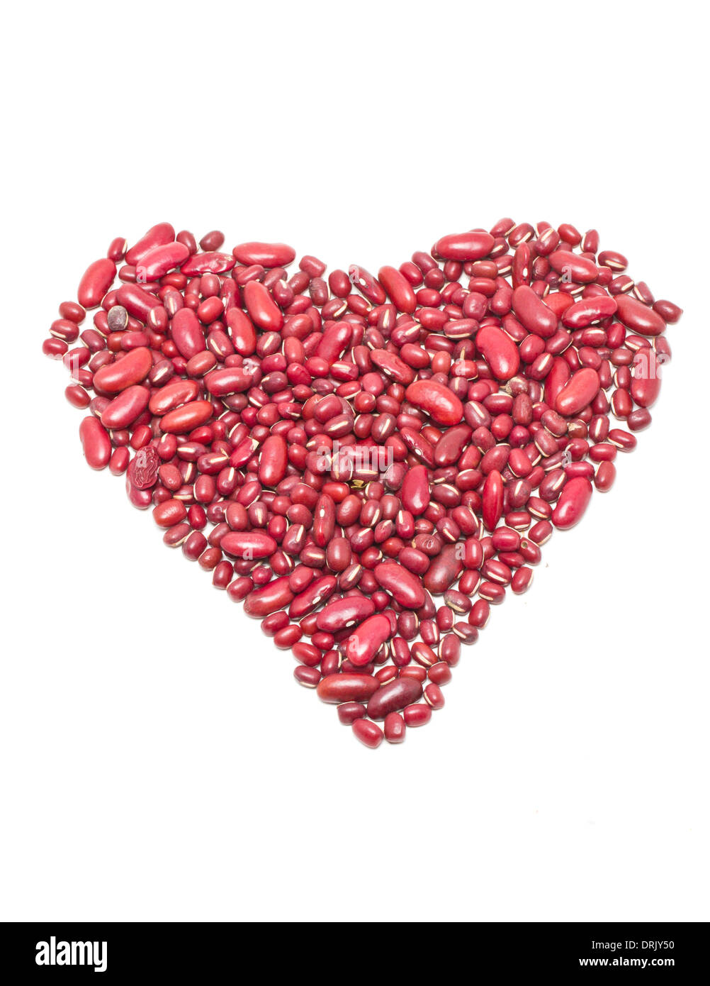Red kidney beans heart shape isolated on white. Stock Photo