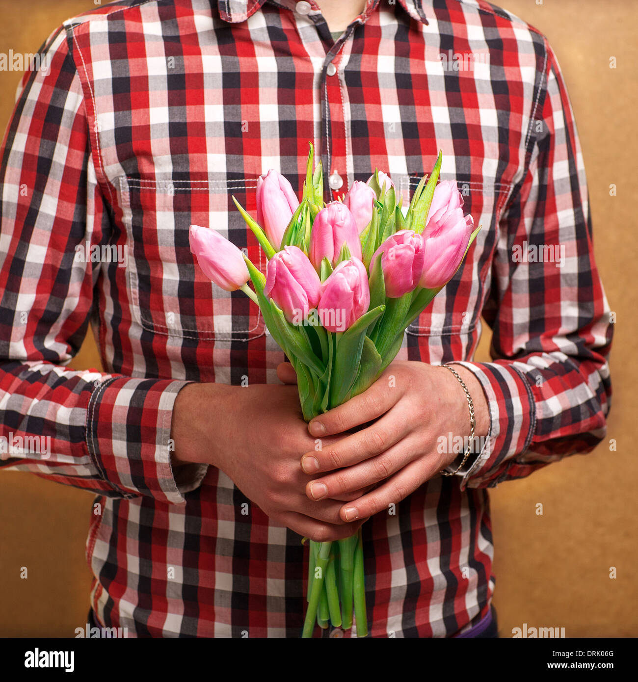 man with tulips waiting his woman. Valentine's Day. Mother's Day. Stock Photo
