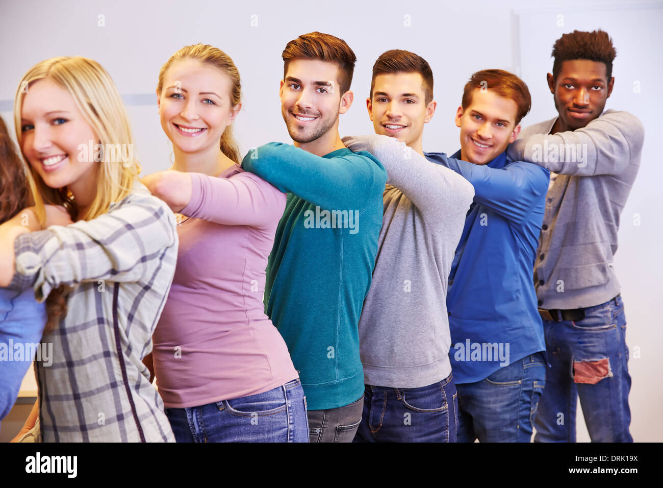 Group students standing behind hi-res stock photography and images - Alamy