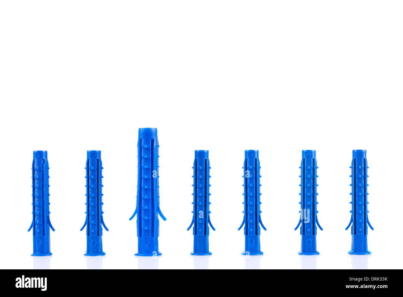 Group of plastic dowels on white background Stock Photo
