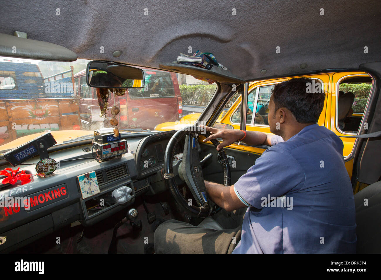 A taxi stuck in a traffic jam in Calcutta, India. Stock Photo