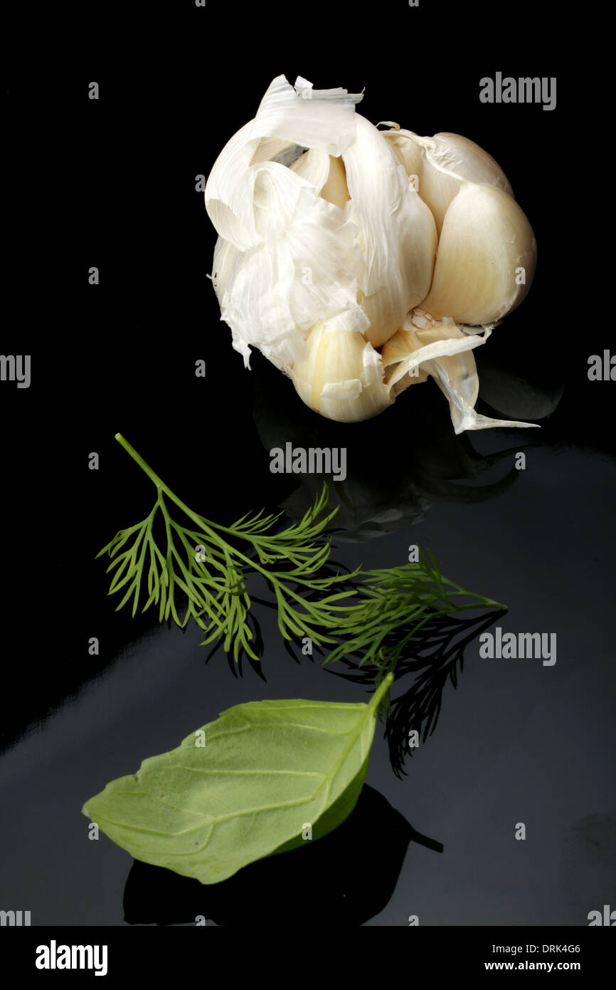 white garlic on a black background Stock Photo