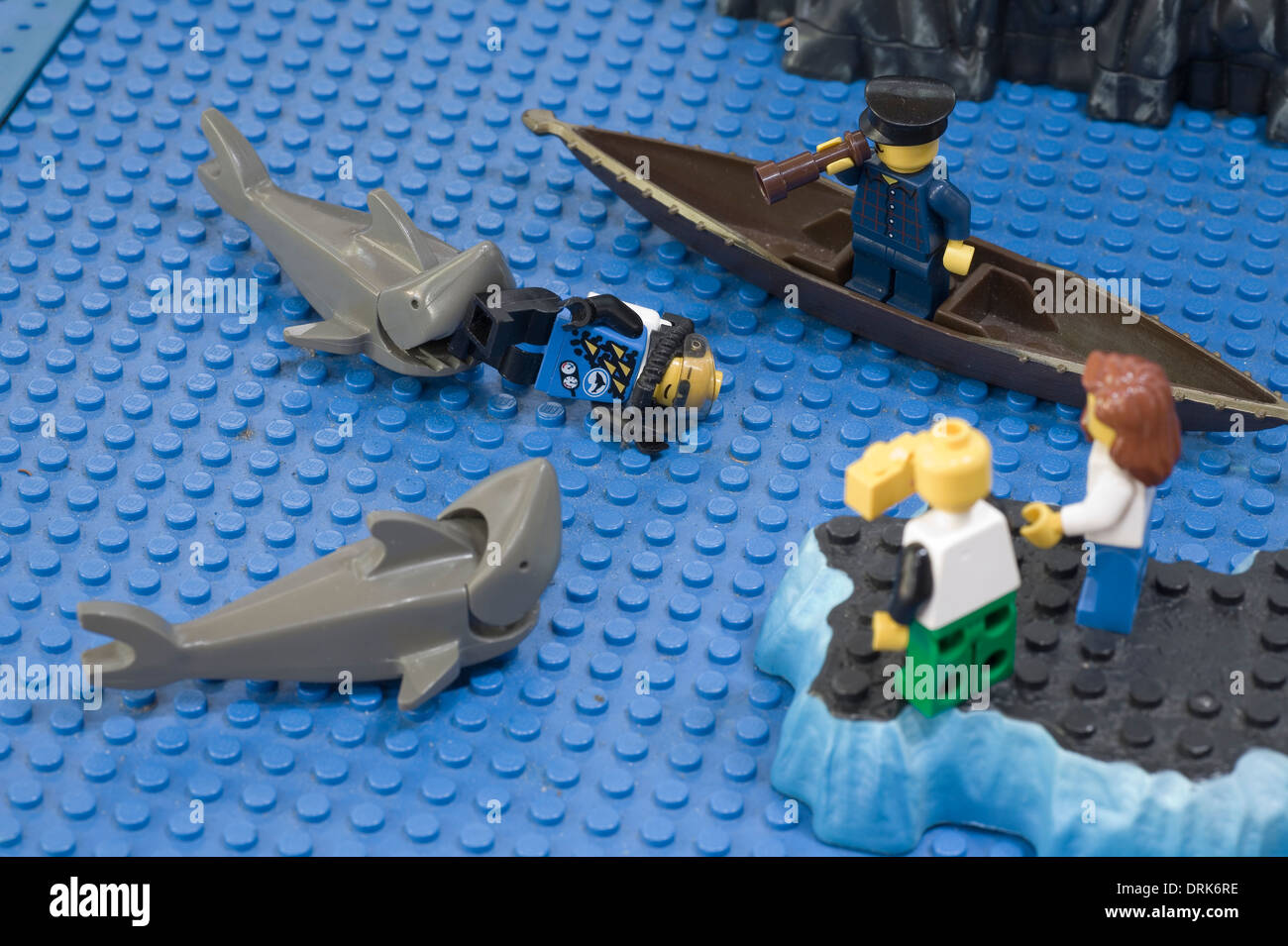 A scuba diver is attacked by a Great White shark in legoland, Stock Photo