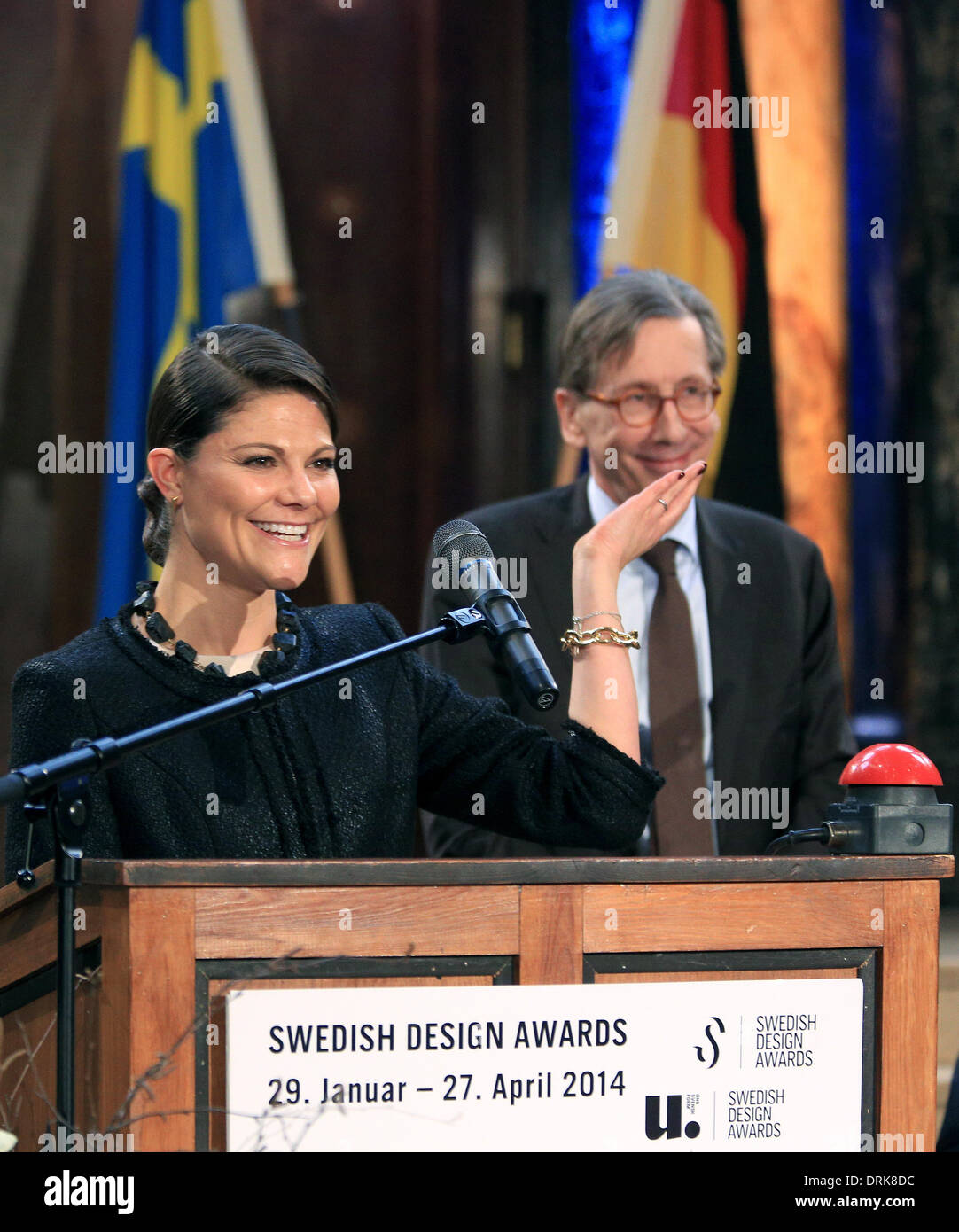 Hamburg, Germany. 28th Jan, 2014. Swedish crown princess Victoria stands next to Sweden's ambassador Staffan Carlsson as she speaks at the Museum of Ethnology in Hamburg, Germany, 28 January 2014. The 36 year old Swedish crown princess and her 40 year old husband are on a two-day trip to Hamburg, Duesseldorf and Essen with an economic delegation. Photo: CHRISTIAN CHARISIUS/DPA/Alamy Live News Stock Photo