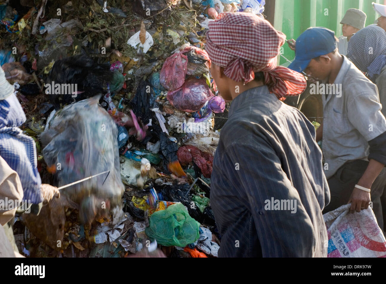 A group of scavengers are collecting recyclable material at the toxic Stung Meanchey Landfill in Phnom Penh, Cambodia. Stock Photo