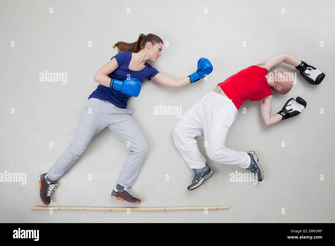 Man getting knocked out in boxing fight Stock Photo