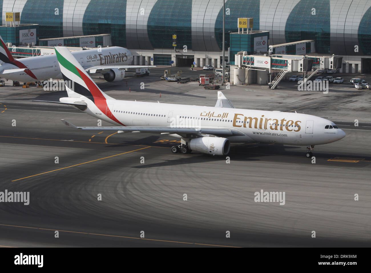 Emirates Airlines Airbus A330-200 taxiing out for departure from Dubai International Airport, UAE Stock Photo