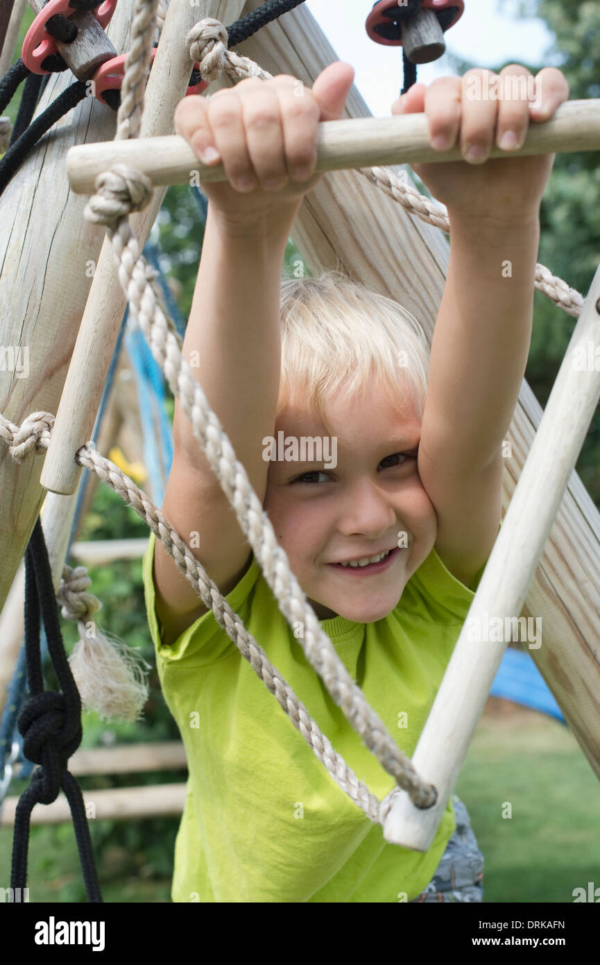 Little boy at climbing frame Stock Photo Alamy