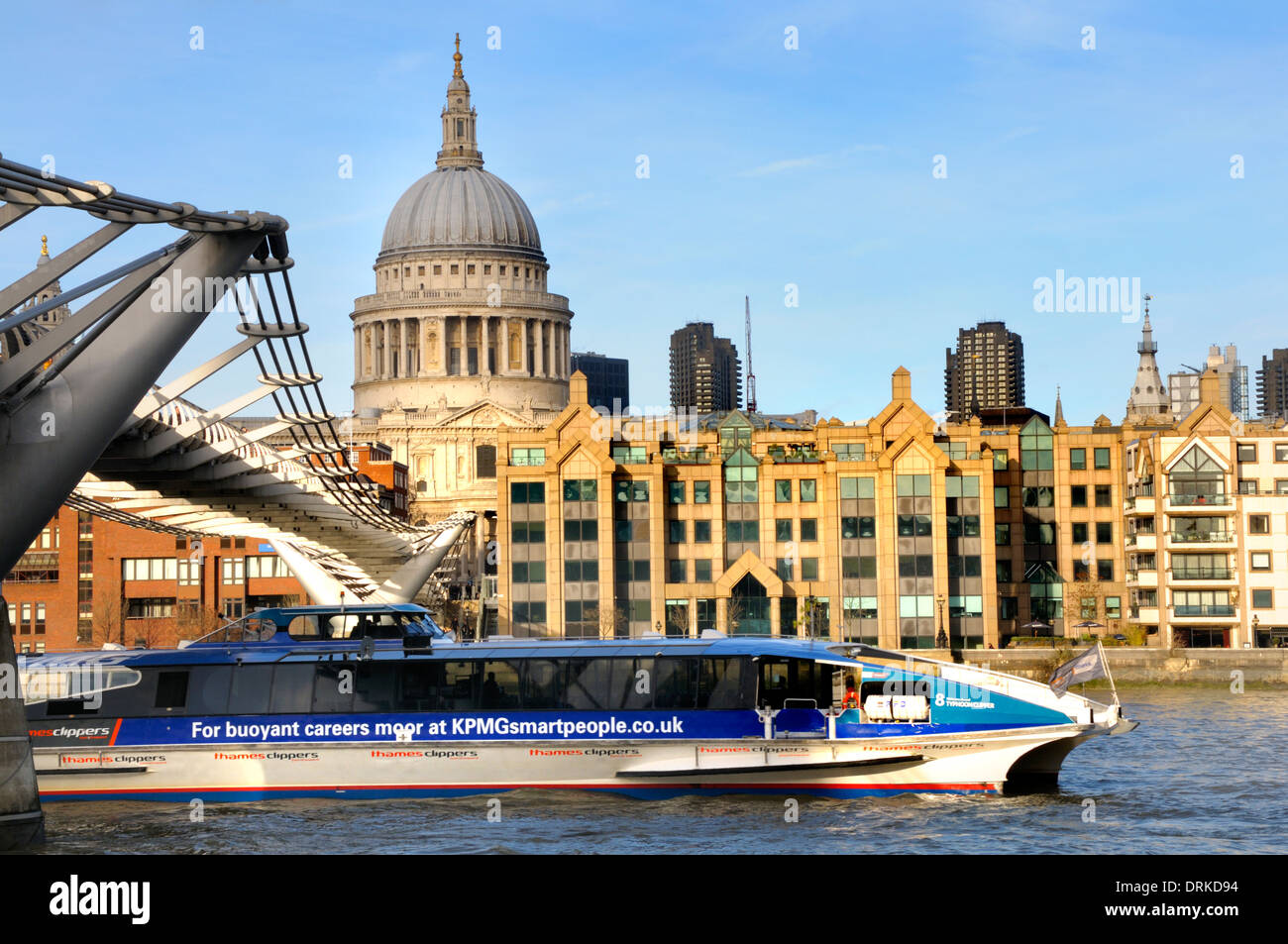 London, England, UK. St Paul's Cathedral and the millennium bridge seen across the river Thames from the South Bank. Stock Photo