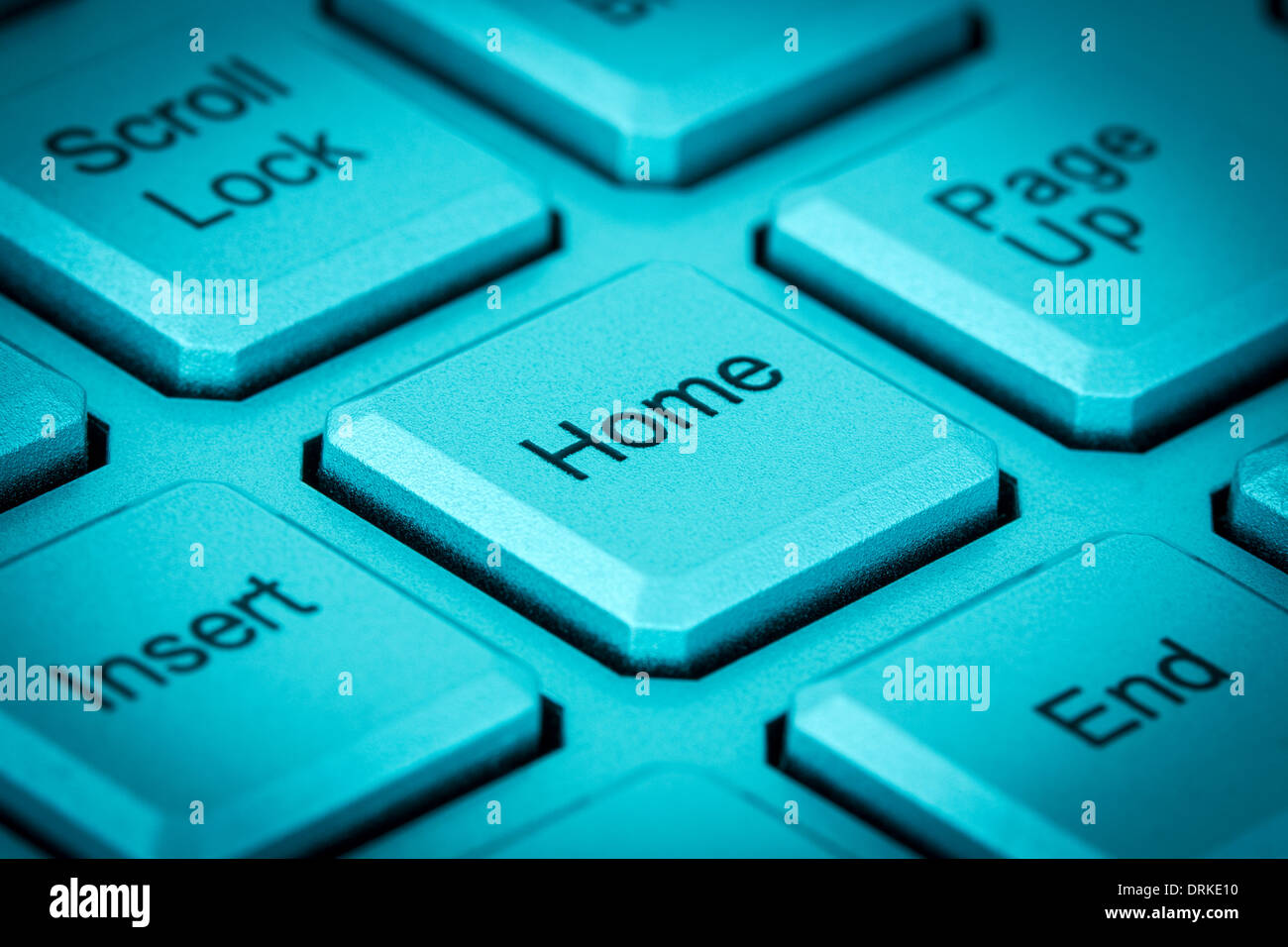 Home key on a keyboard in a blue tone Stock Photo Alamy