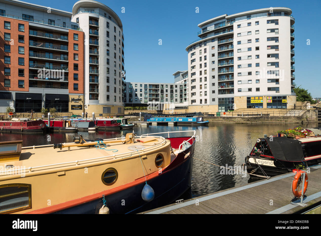 Boats and apartment buildings at Clarence Dock, Leeds, England Stock