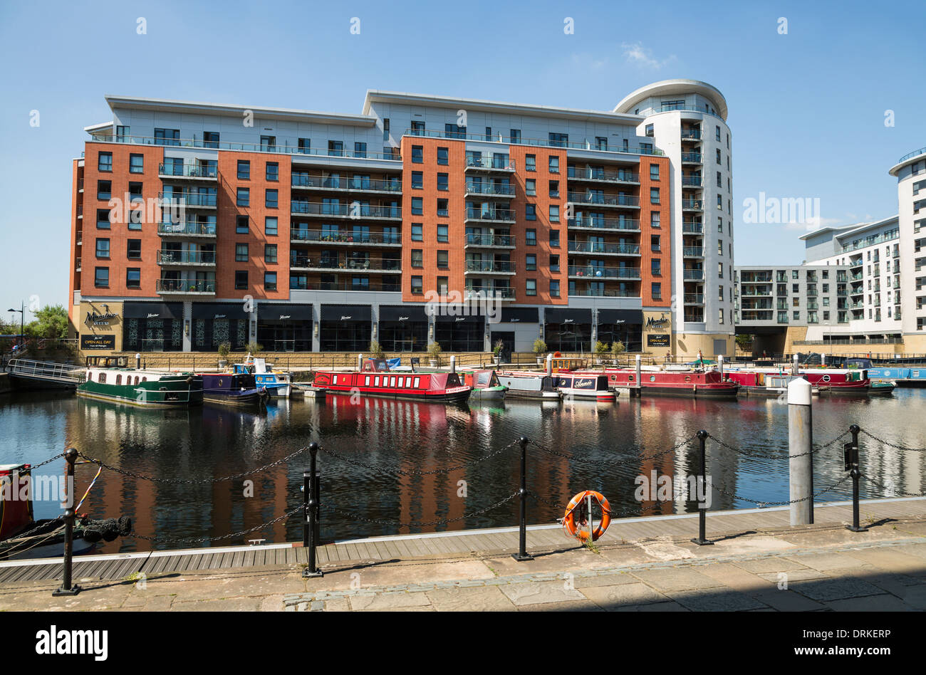 Boats and apartment buildings at Clarence Dock, Leeds, England Stock