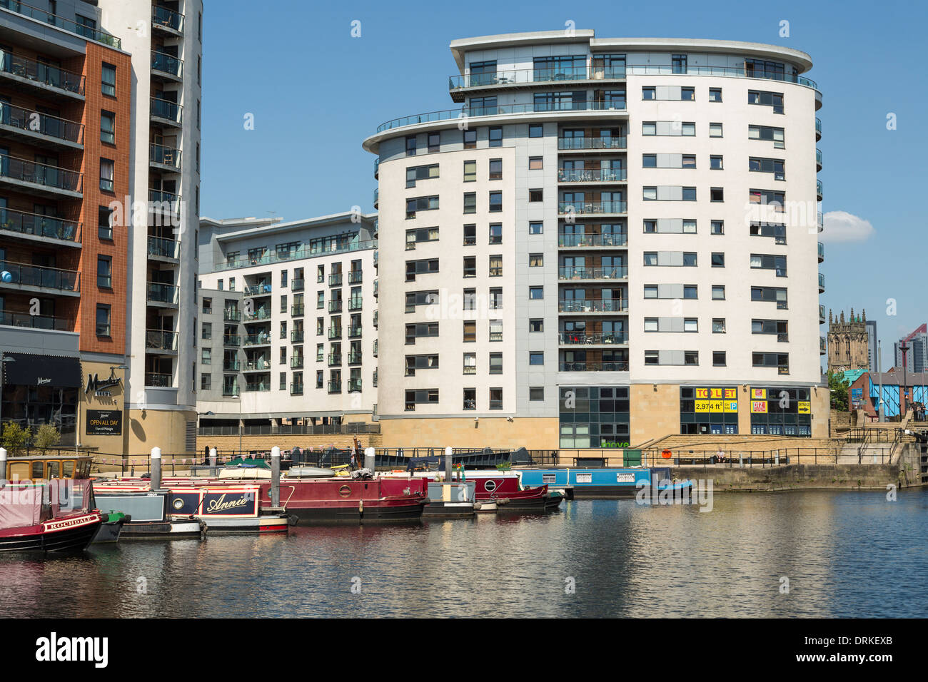Boats and apartment buildings at Clarence Dock, Leeds, England Stock