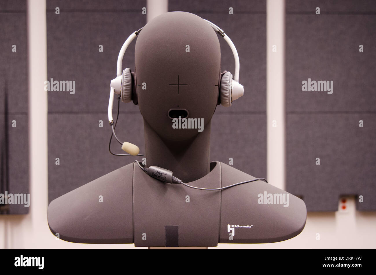 A dummy's head with headset in a lab in Sunnyvale, California, is used to test sound quality for the new Dolby Voice service, which introduces surround sound to conference calls. - 2013. Stock Photo