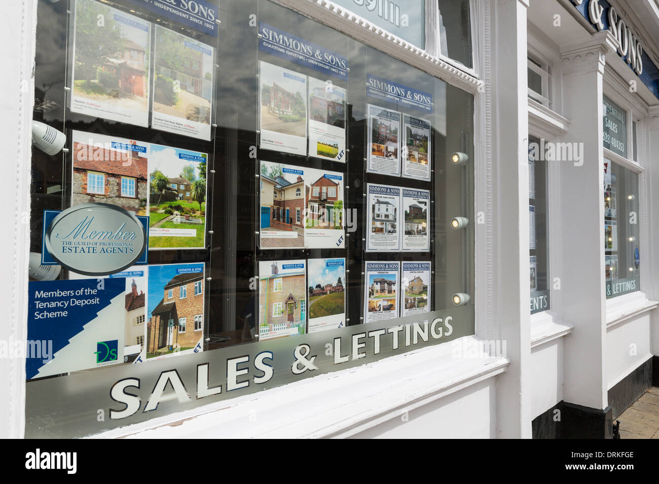 Simmons & Sons estate agents shop window Stock Photo