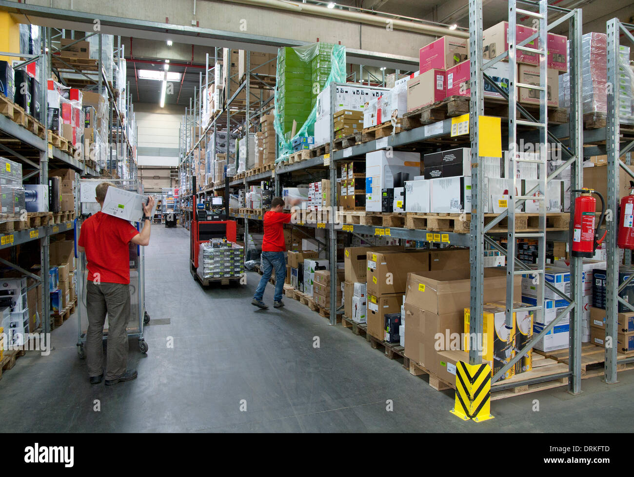 Workers in a warehouse Stock Photo