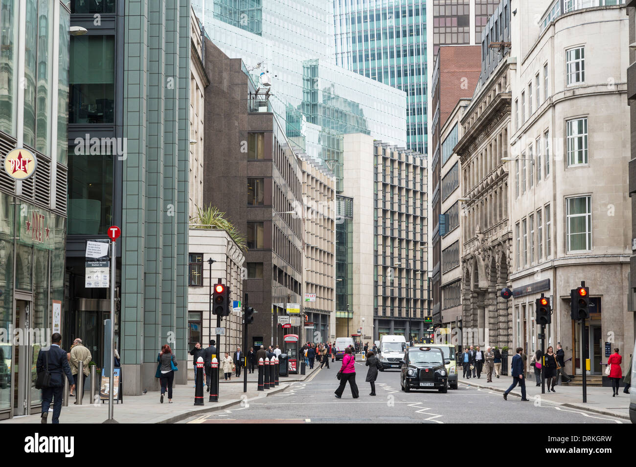 Taxis and office workers, Fenchurch Street the City of London, England Stock Photo