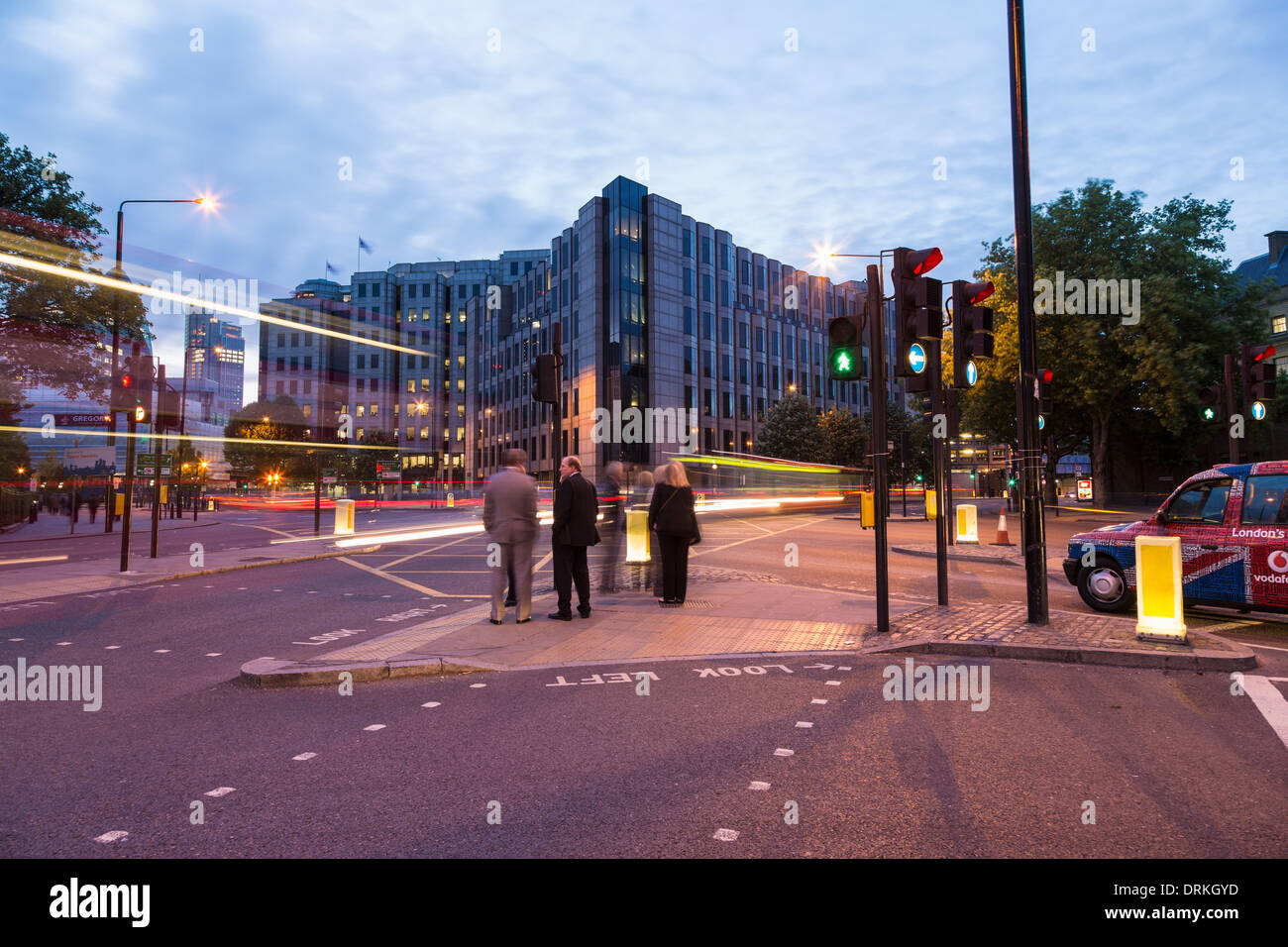 Office workers at traffic lights, London Stock Photo