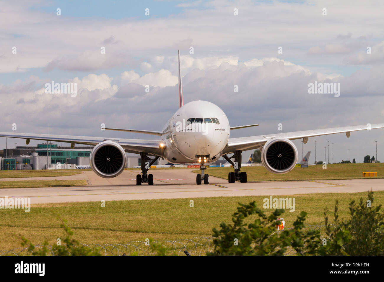 Boeing 777 on runway for take off at Manchester Airport Stock Photo