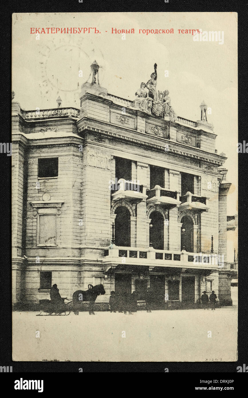 New City Theatre in Yekaterinburg, Russian Empire. Black and white vintage photograph by Russian photographer Nikolai Vvedensky dated from the beginning of the 20th century issued in the Russian vintage postcard published by M.S. Semkov, Yekaterinburg. Text in Russian: Yekaterinburg. New municipal theatre. The New City Theatre opened in 1912 serves now as the State Opera and Ballet Theatre in Yekaterinburg. Courtesy of the Azoor Postcard Collection. Stock Photo