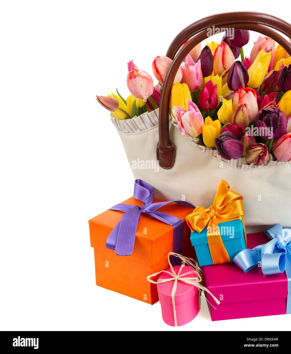 Bag of tulips with gift boxes Stock Photo