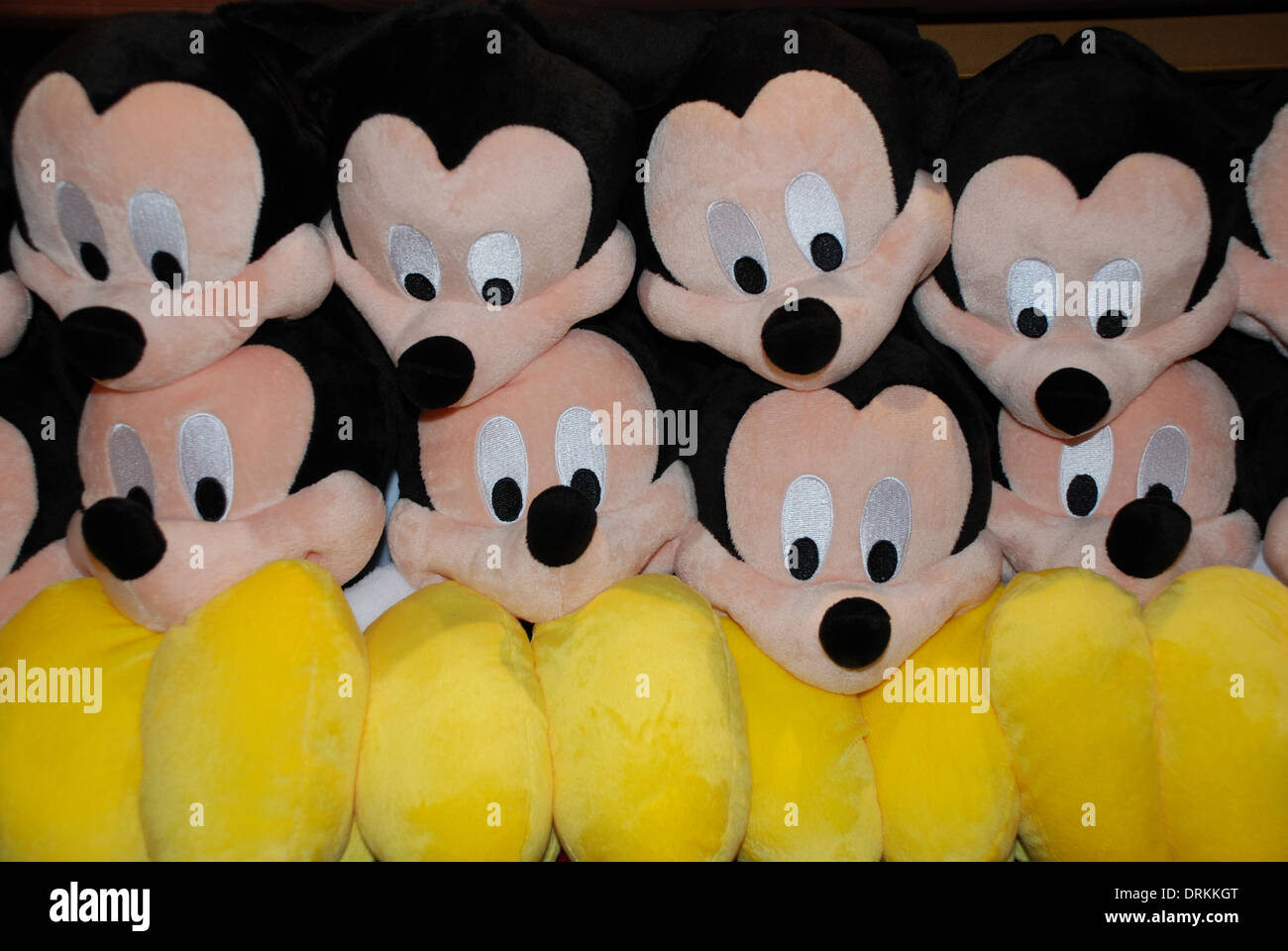 Mickey Mouse soft toys on a shop shelf in Disneyland Orlando Stock Photo