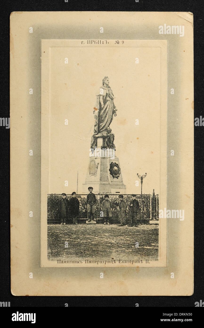 Monument to Empress Catherine the Great in the town of Irbit in the Ural Mountains, Russian Empire. Black and white vintage photograph by an unknown photographer dated from the beginning of the 20th century issued in the Russian vintage postcard published by N.D. Larkov. Text in Russian: Irbit. Monument to Empress Catherine the Great. Irbit is a town in Sverdlovsk region, Russia, located some 203 km from Yekaterinburg. The town was famous in the 19th century for the Irbit Fair, which was the second largest in Russia. Courtesy of the Azoor Postcard Collection. Stock Photo