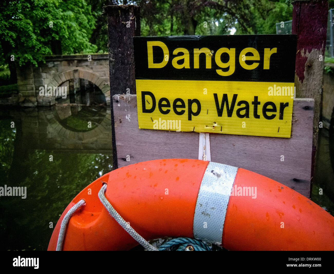 Danger, Deep Water sign and lifebelt Stock Photo