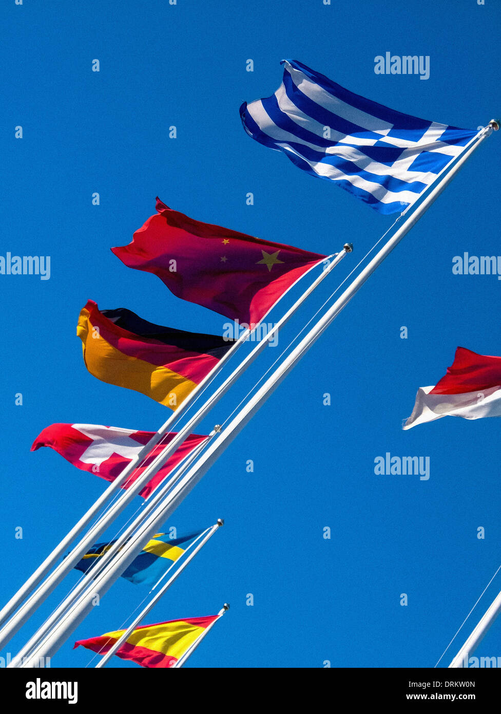European Flags against blue sky Stock Photo