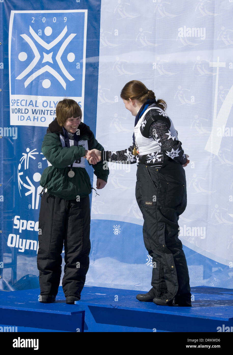 Special Olympics Invitational Winter Games Idaho 2008, winners of Alpine skiing events receiving award medals Stock Photo