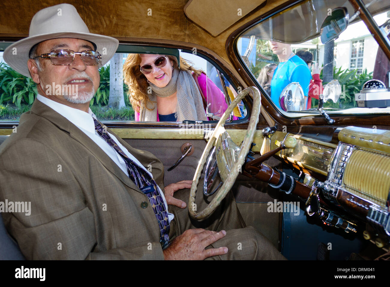 Miami Beach Florida,Ocean Drive,Art Deco Weekend,festival,street fair,event,antique classic car cars automobile show,1941 Chrysler,adult adults man me Stock Photo