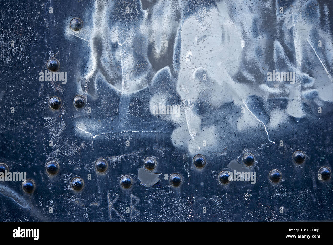 Dirty Sprayed Aged Metal Background with Rivets. Stock Photo