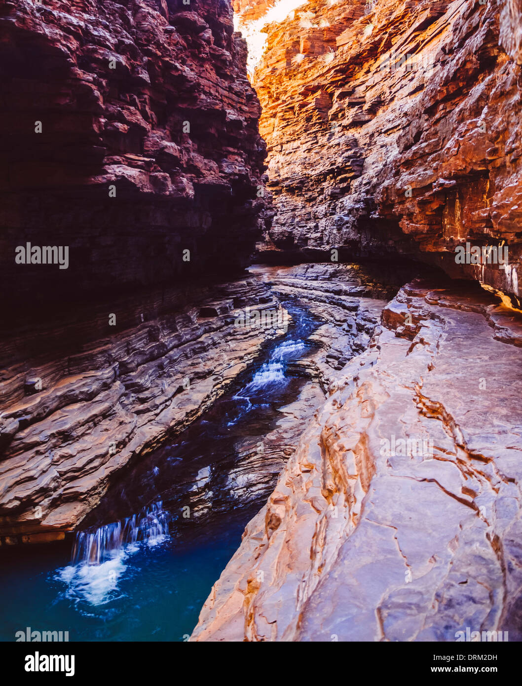 Australia, Western Australia, Karijini National Park, Stream running ...