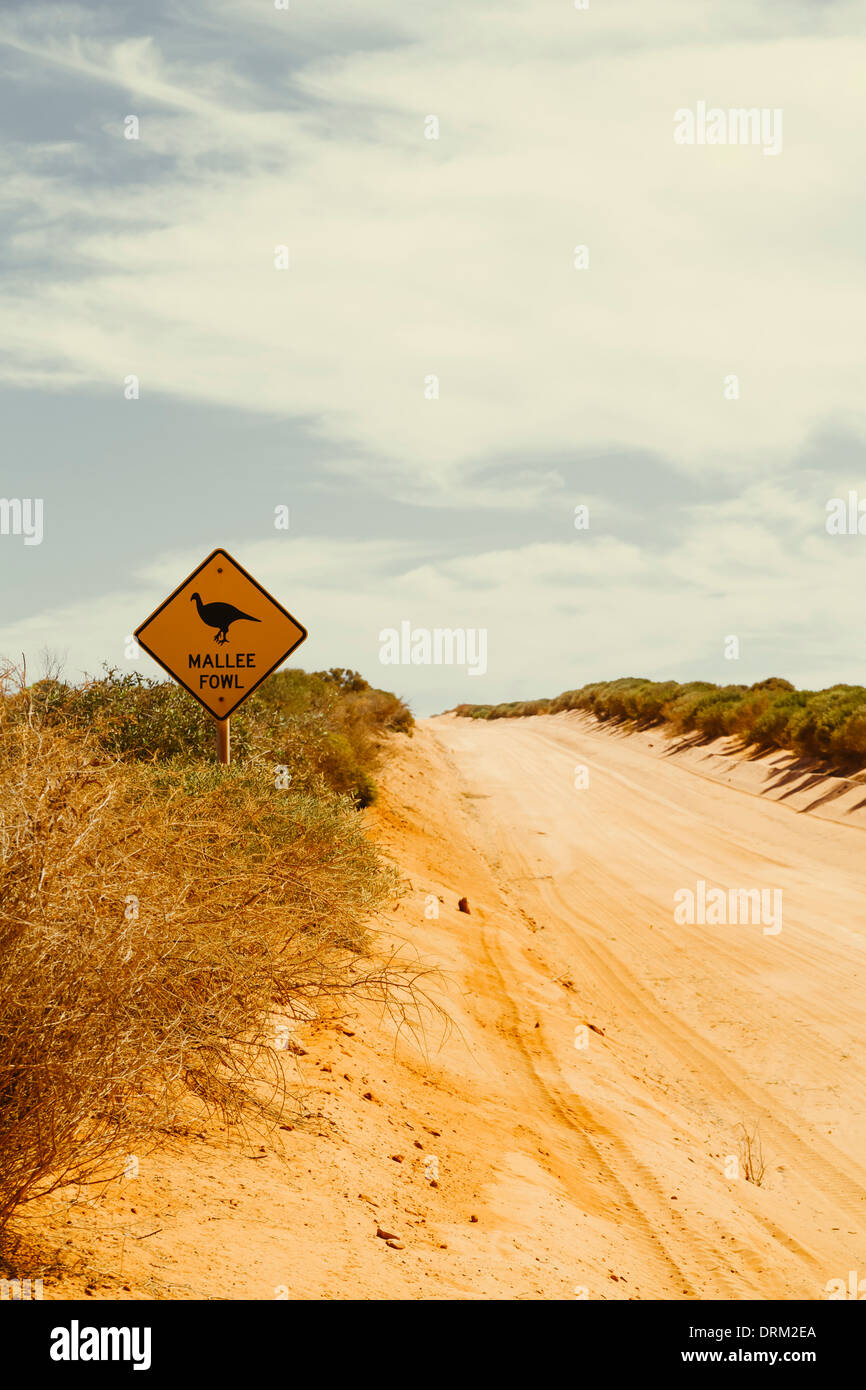 Australia, Outback, Animal crossing sign on sandy road Stock Photo - Alamy