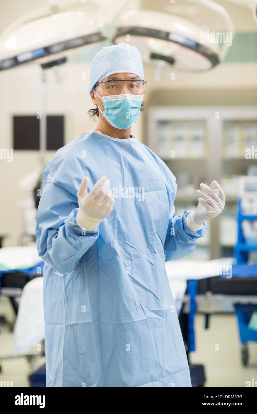 Doctor In Surgical Gown in Operation Room Stock Photo