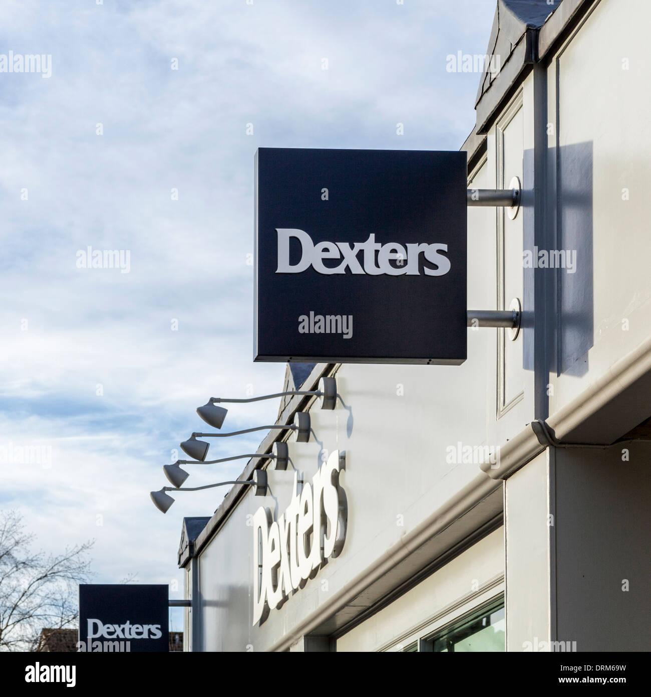 Dexters estate agent sign in Teddington High Street, Greater London, Uk
