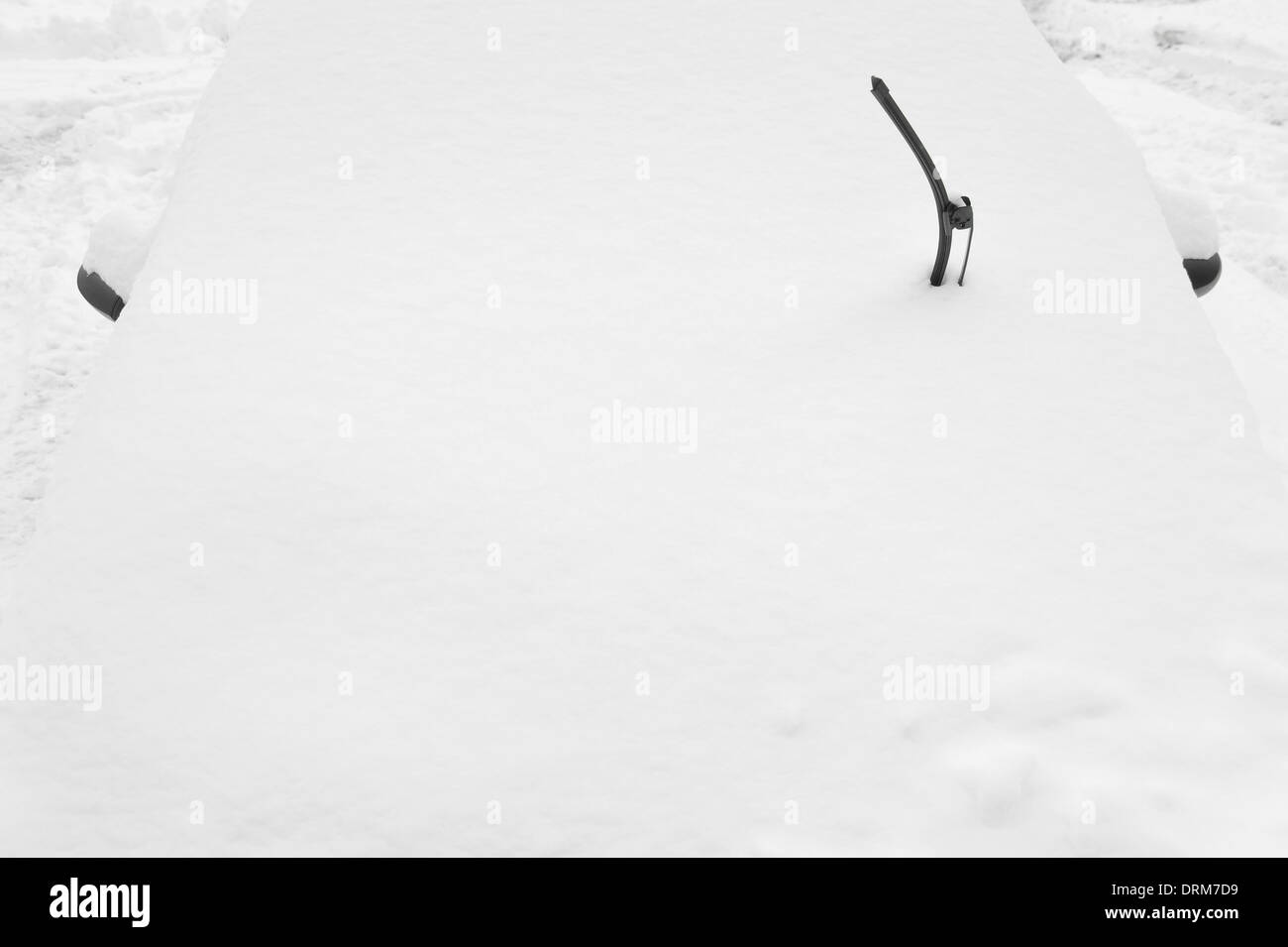 Snow covered car after heavy snowfall Stock Photo