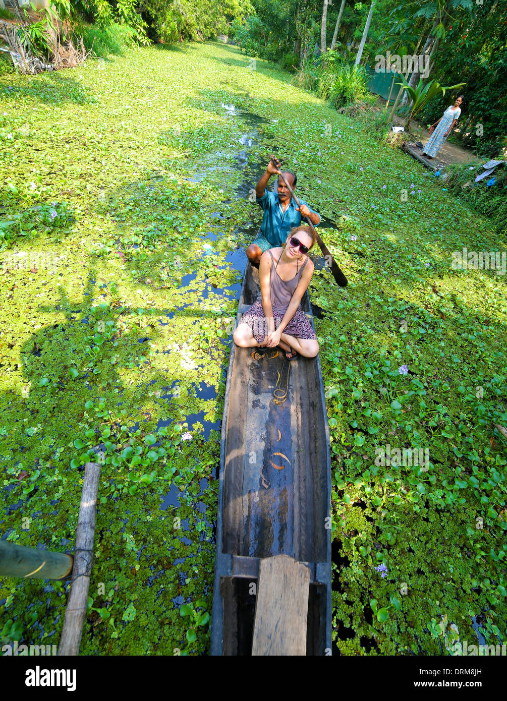 KERALA, INDIA - APRIL 2013: Canoe at alleppey backwaters Stock Photo