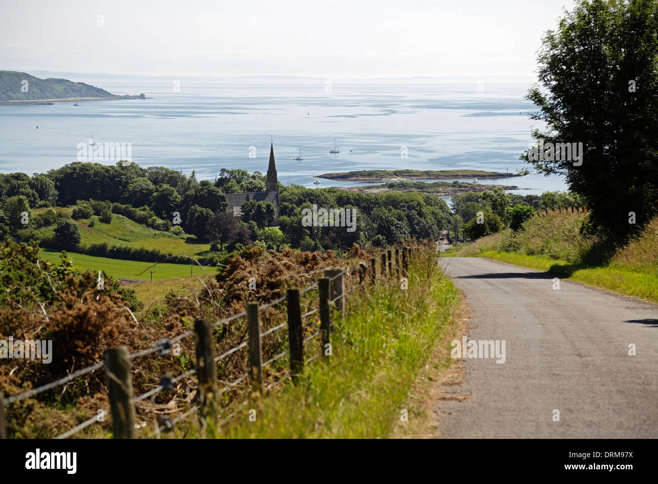 View South over Millport and the Firth of Clyde from Gladstone Hill on the Island of Great Cumbrae, North Ayrshire, Scotland, UK Stock Photo