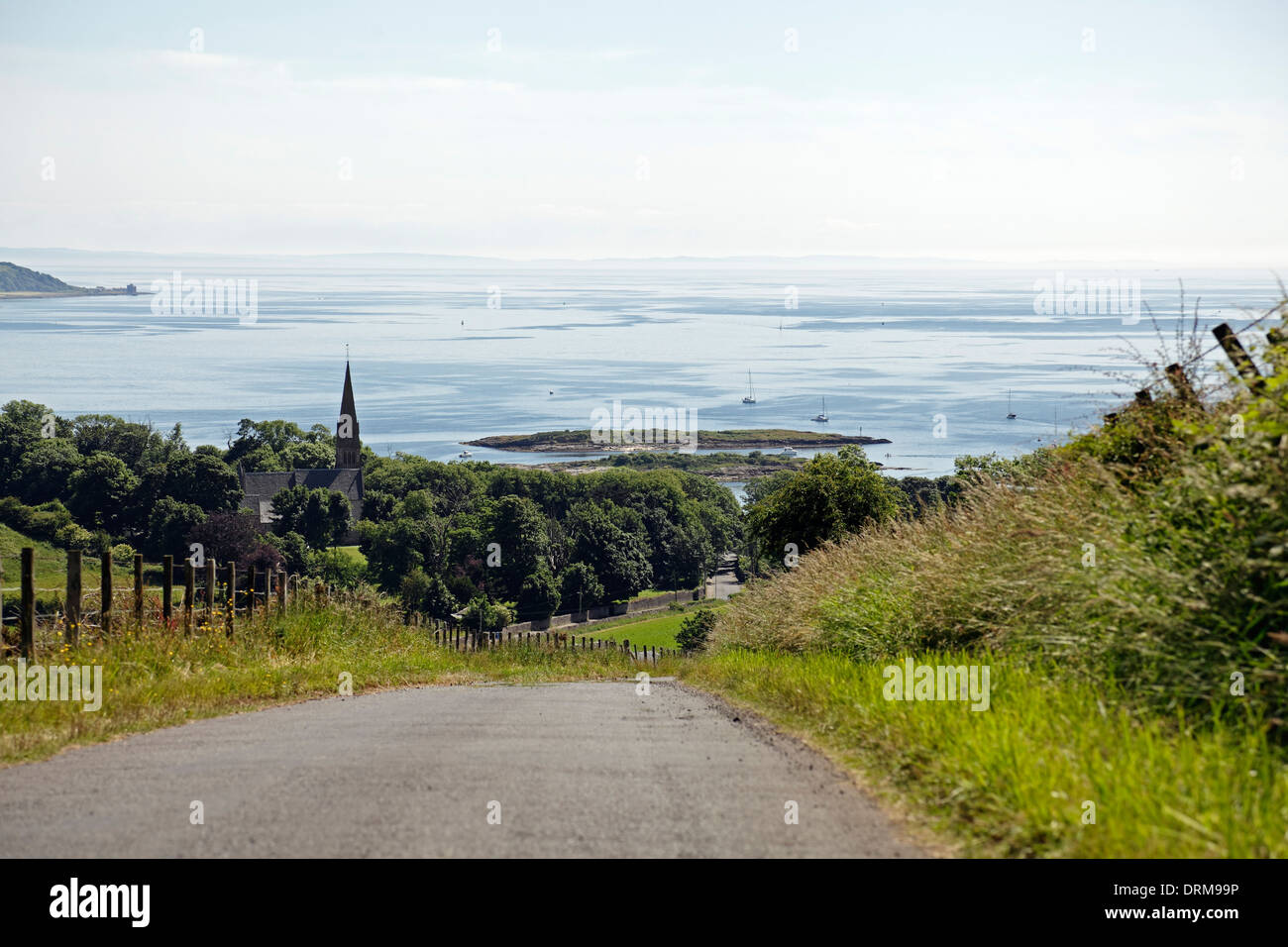 View South over Millport and the Firth of Clyde from Gladstone Hill on the Island of Great Cumbrae, North Ayrshire, Scotland, UK Stock Photo