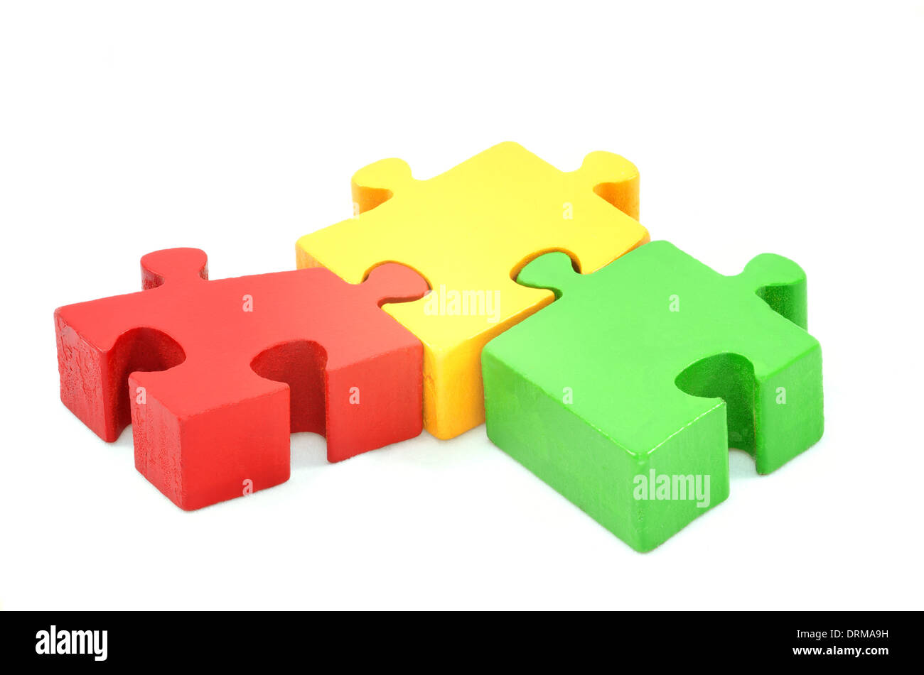 Collaboration concept  jigsaw puzzle isolated on white Stock Photo