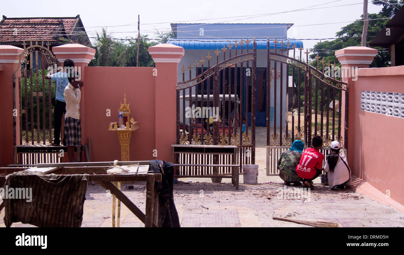 Children by gates Phnom Penh Cambodia South East Asia Stock Photo - Alamy