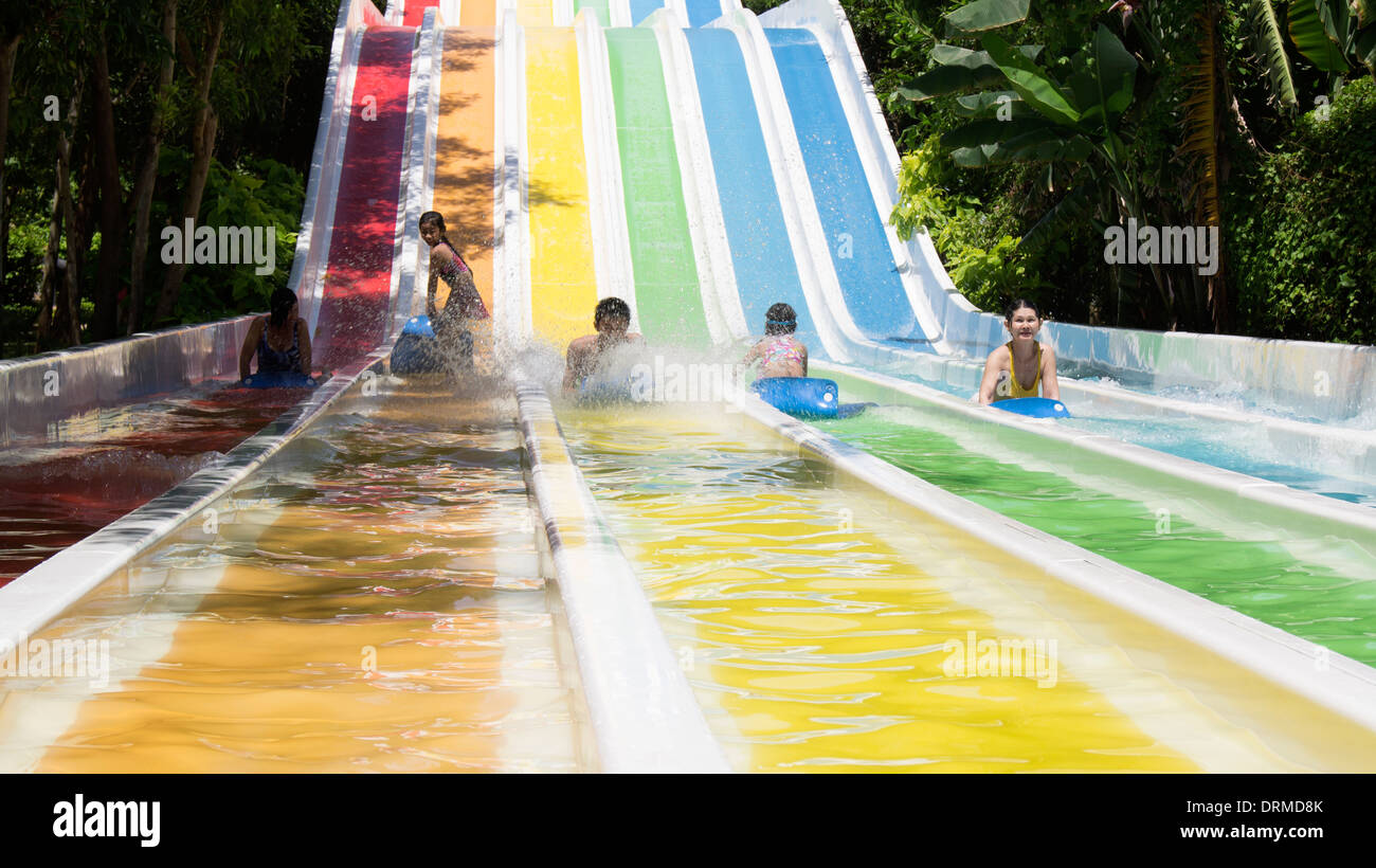 Children on water slide fun Nha Trang Vietnam South East Asia Stock Photo